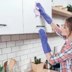 Remove sticky grease from kitchen cabinets